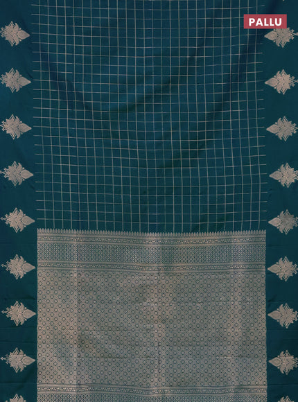 Semi soft silk saree dual shade of greenish blue with allover zari woven checked pattern and zari woven butta border