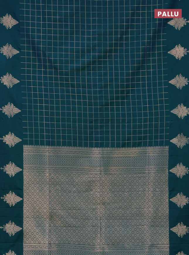 Semi soft silk saree dual shade of greenish blue with allover zari woven checked pattern and zari woven butta border