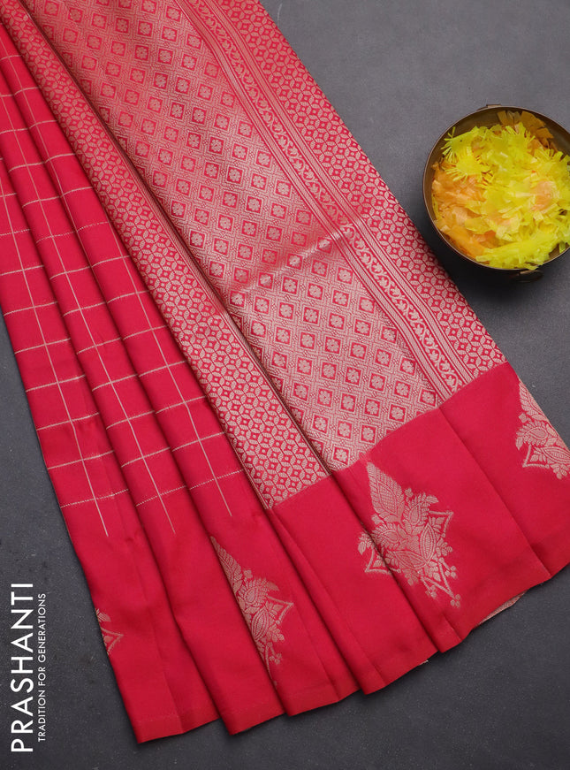 Semi soft silk saree pink with allover zari woven checked pattern and zari woven butta border
