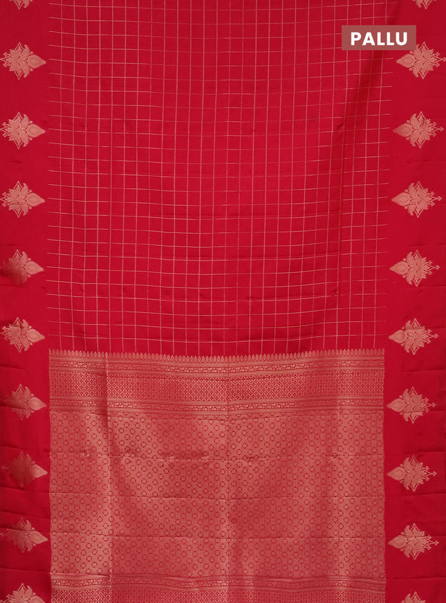 Semi soft silk saree pink with allover zari woven checked pattern and zari woven butta border