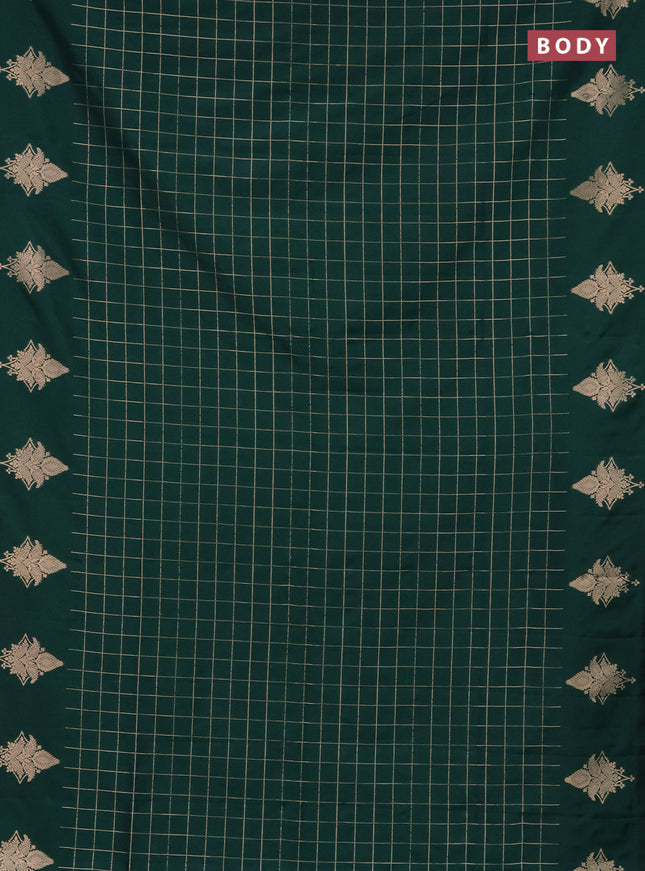 Semi soft silk saree green with allover zari woven checked pattern and zari woven butta border