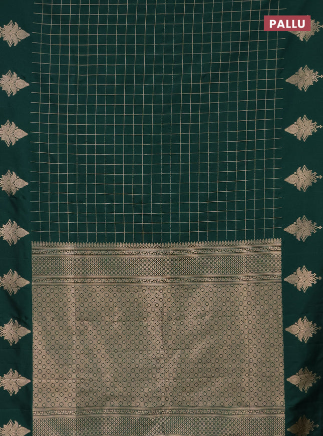 Semi soft silk saree green with allover zari woven checked pattern and zari woven butta border