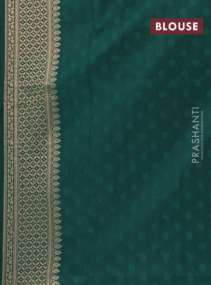 Semi soft silk saree green with allover zari woven checked pattern and zari woven butta border