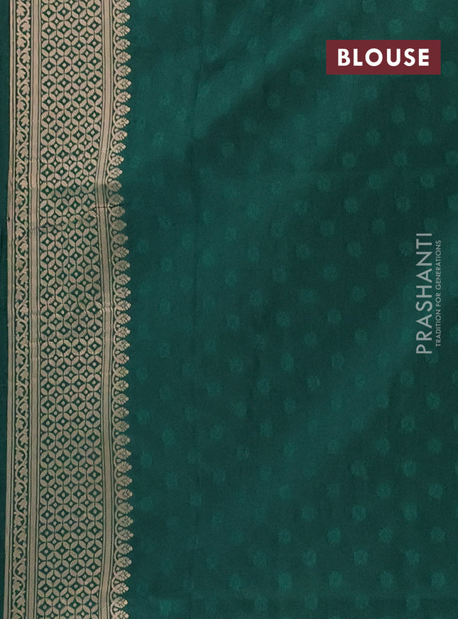 Semi soft silk saree green with allover zari woven checked pattern and zari woven butta border