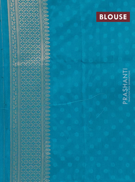 Semi soft silk saree teal blue shade with allover zari woven checked pattern and zari woven butta border