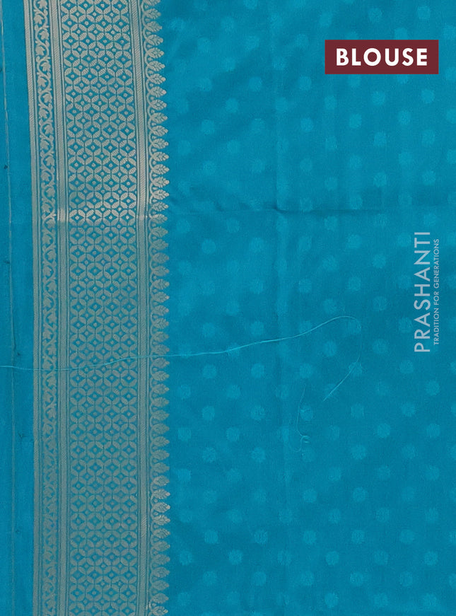 Semi soft silk saree teal blue shade with allover zari woven checked pattern and zari woven butta border