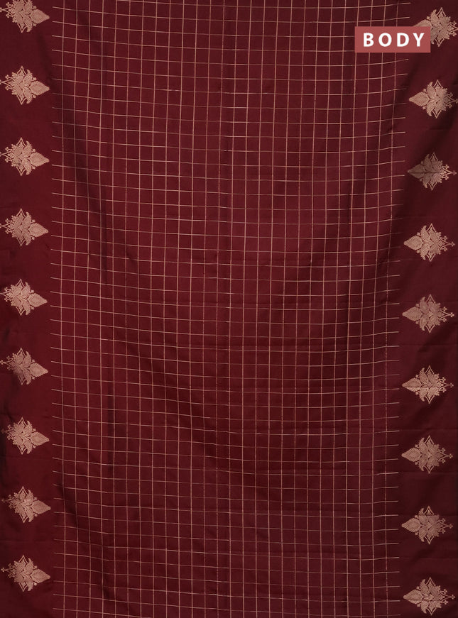 Semi soft silk saree maroon with allover zari woven checked pattern and zari woven butta border