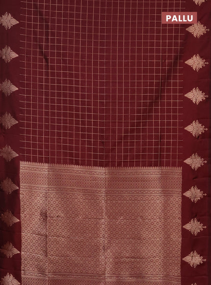 Semi soft silk saree maroon with allover zari woven checked pattern and zari woven butta border