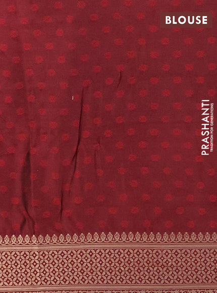 Semi soft silk saree maroon with allover zari woven checked pattern and zari woven butta border