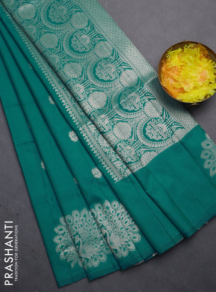 Semi soft silk saree teal blue with zari woven buttas and zari woven peacock butta border