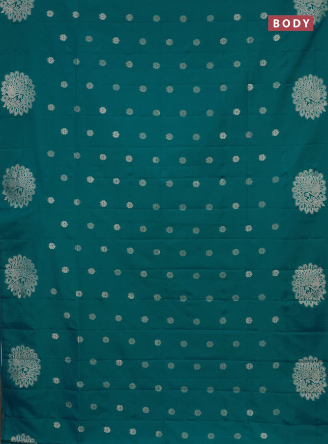 Semi soft silk saree teal blue with zari woven buttas and zari woven peacock butta border
