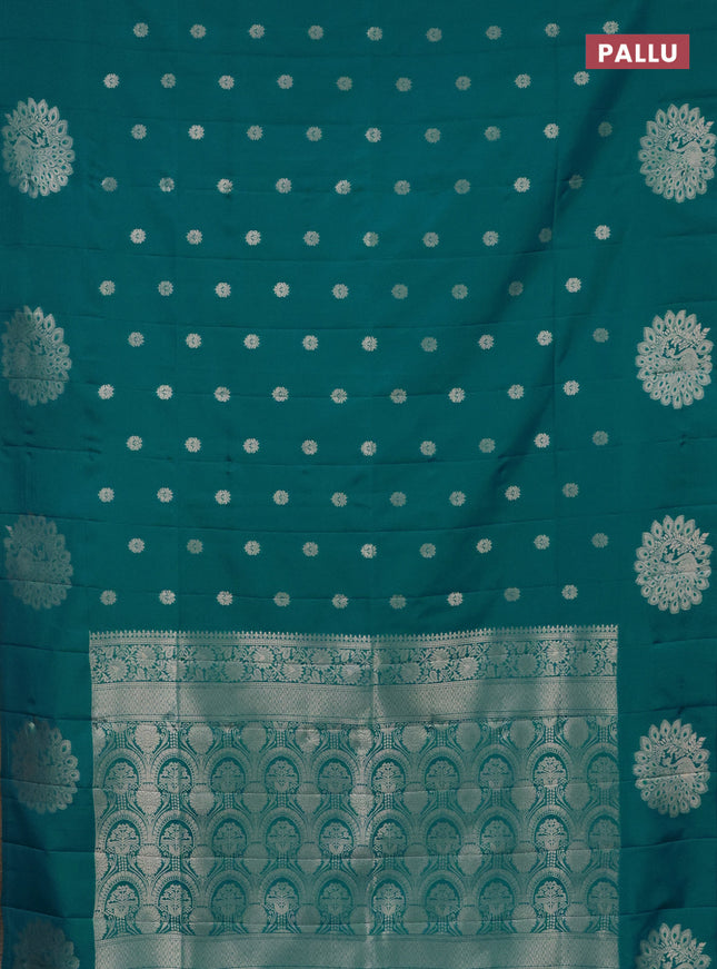 Semi soft silk saree teal blue with zari woven buttas and zari woven peacock butta border