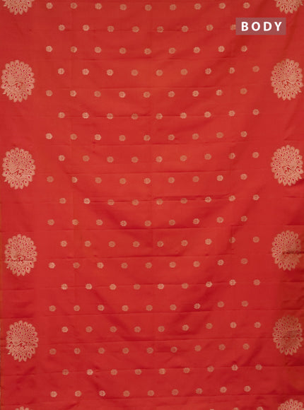 Semi soft silk saree dual shade of pinkish orange with zari woven buttas and zari woven peacock butta border