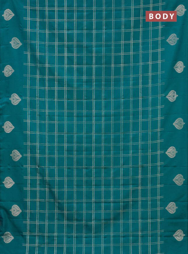 Semi soft silk saree teal blue with allover zari checked pattern and zari woven butta border