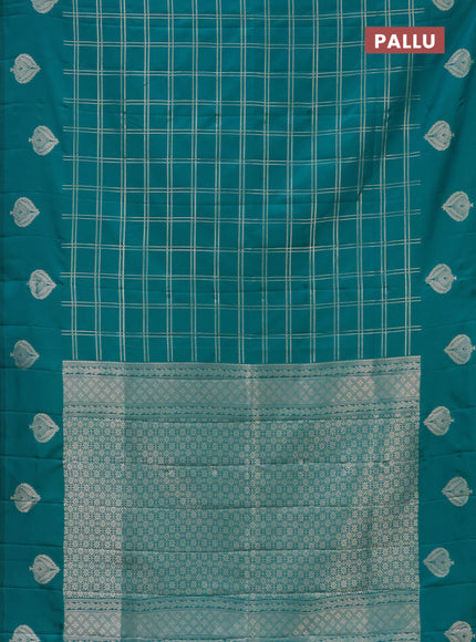 Semi soft silk saree teal blue with allover zari checked pattern and zari woven butta border