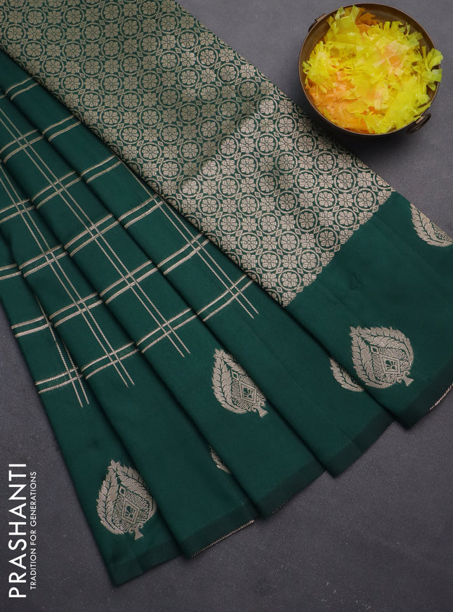 Semi soft silk saree dark green with allover zari checked pattern and zari woven butta border
