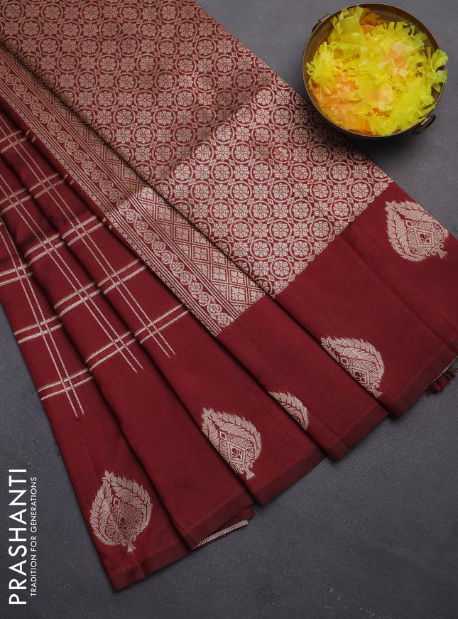 Semi soft silk saree maroon with allover zari checked pattern and zari woven butta border
