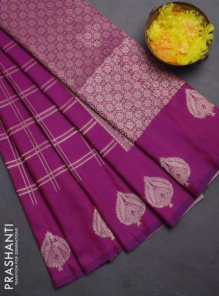 Semi soft silk saree dual shade of purple with allover zari checked pattern and zari woven butta border