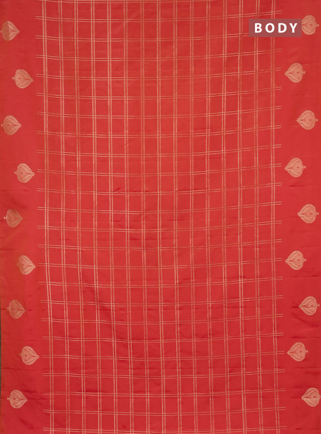 Semi soft silk saree dual shade of pinkish orange with allover zari checked pattern and zari woven butta border