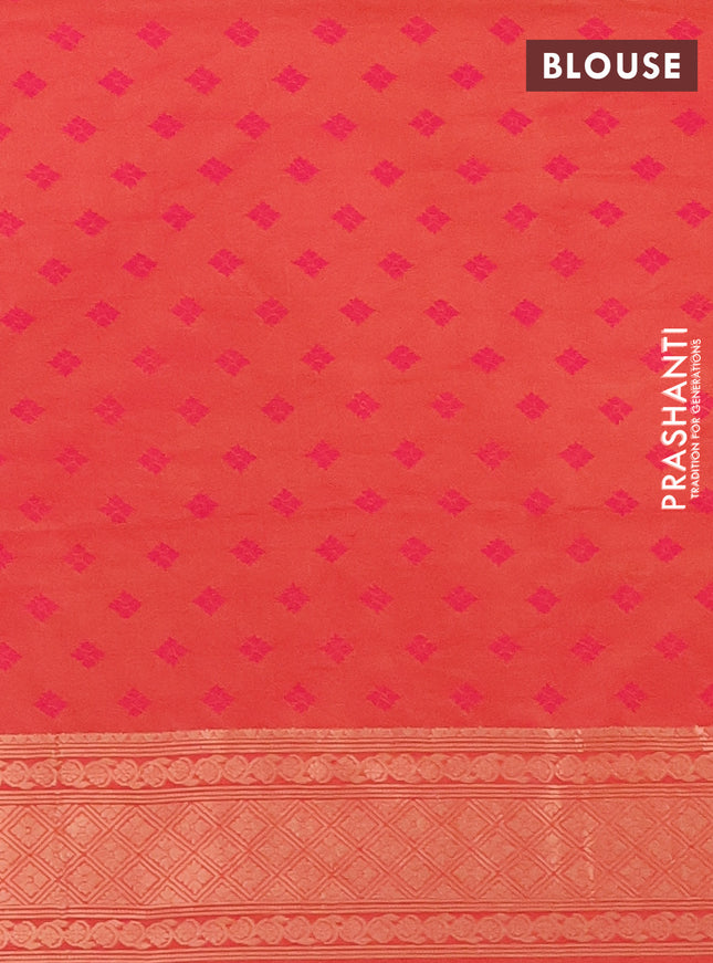 Semi soft silk saree dual shade of pinkish orange with allover zari checked pattern and zari woven butta border