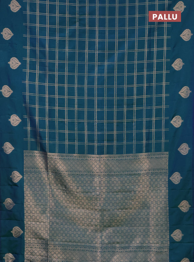 Semi soft silk saree dual shade of bluish green with allover zari checked pattern and zari woven butta border