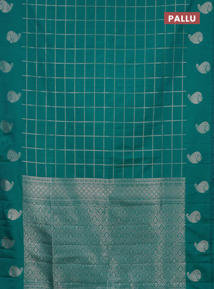 Semi soft silk saree teal blue with allover zari woven checked pattern and zari woven butta border