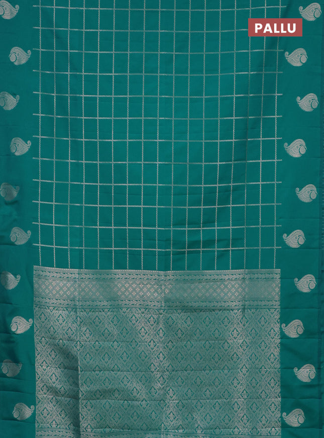 Semi soft silk saree teal blue with allover zari woven checked pattern and zari woven butta border