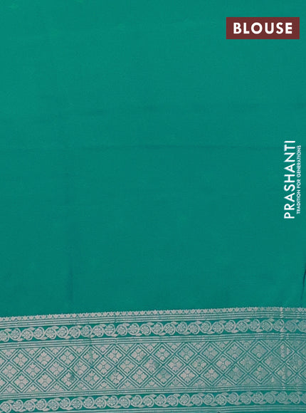 Semi soft silk saree teal blue with allover zari woven checked pattern and zari woven butta border