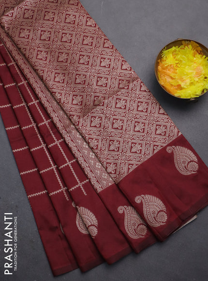 Semi soft silk saree maroon with allover zari woven checked pattern and zari woven butta border