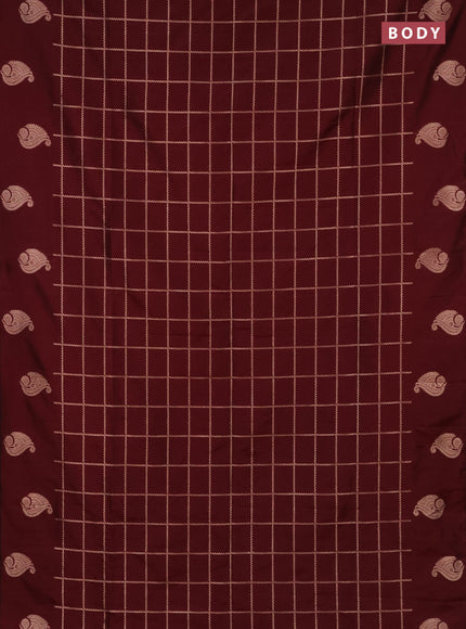 Semi soft silk saree maroon with allover zari woven checked pattern and zari woven butta border