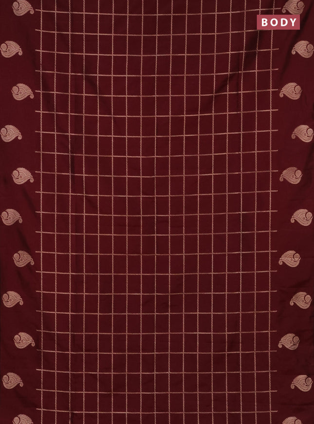 Semi soft silk saree maroon with allover zari woven checked pattern and zari woven butta border