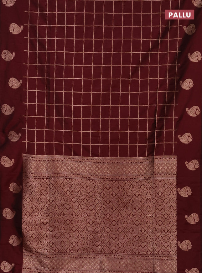 Semi soft silk saree maroon with allover zari woven checked pattern and zari woven butta border