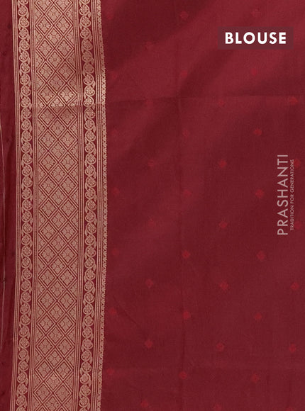 Semi soft silk saree maroon with allover zari woven checked pattern and zari woven butta border