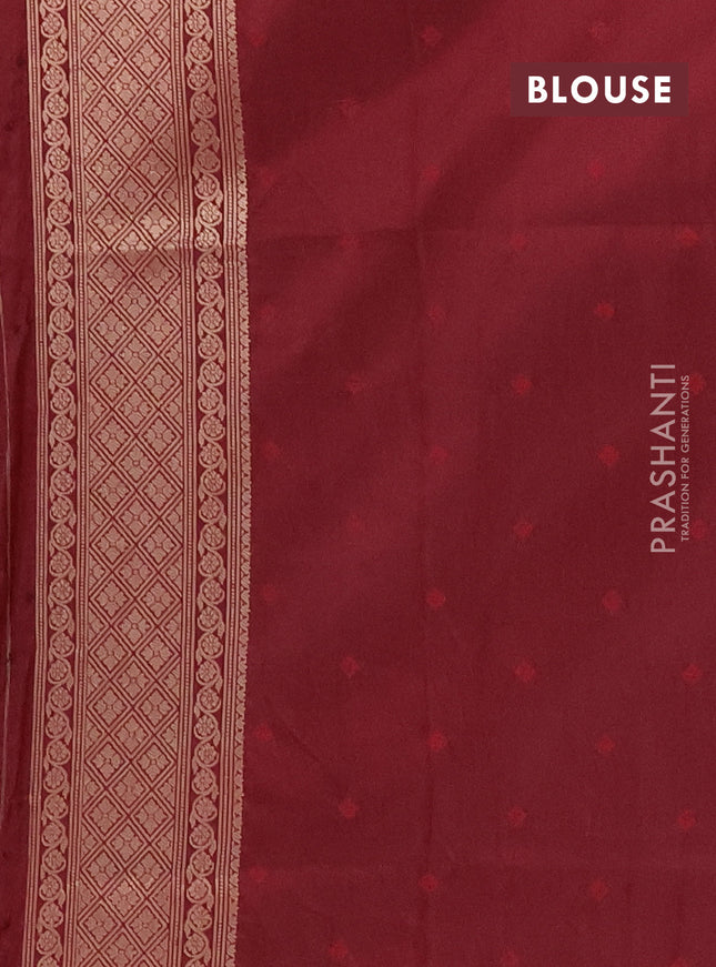 Semi soft silk saree maroon with allover zari woven checked pattern and zari woven butta border