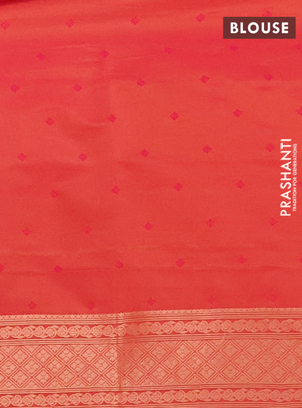 Semi soft silk saree dual shade of pinkish orange with allover zari woven checked pattern and zari woven butta border