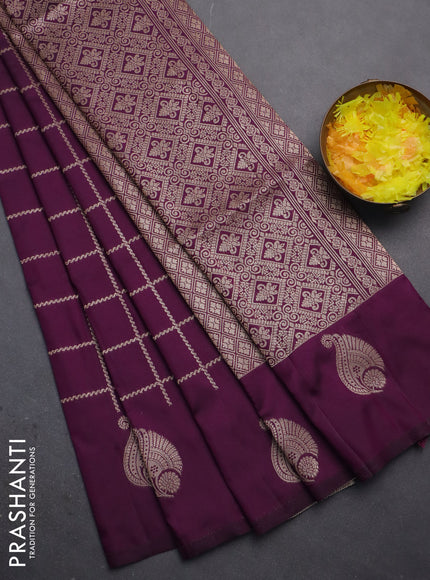 Semi soft silk saree dark purple with allover zari woven checked pattern and zari woven butta border