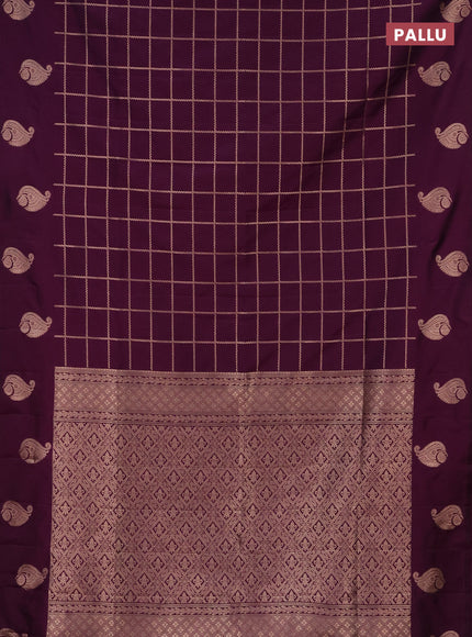 Semi soft silk saree dark purple with allover zari woven checked pattern and zari woven butta border