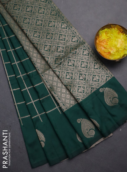 Semi soft silk saree green with allover zari woven checked pattern and zari woven butta border