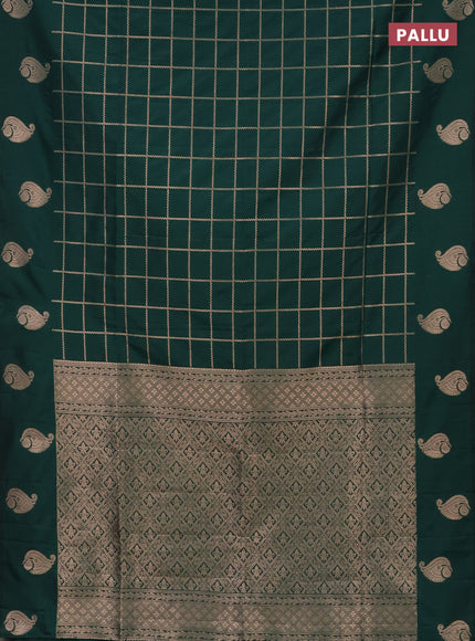 Semi soft silk saree green with allover zari woven checked pattern and zari woven butta border