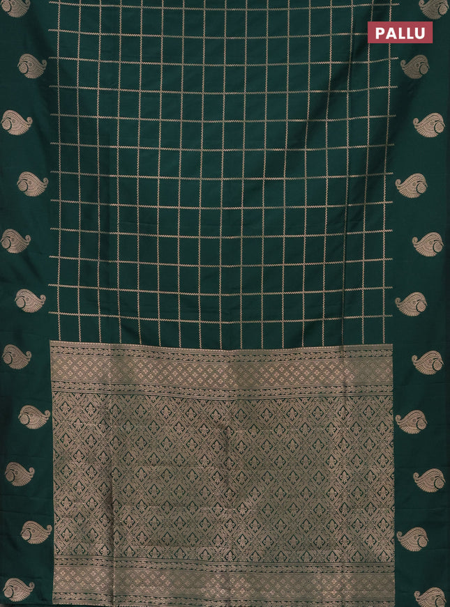 Semi soft silk saree green with allover zari woven checked pattern and zari woven butta border