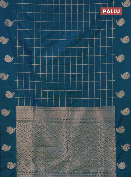 Semi soft silk saree dual shade of greenish blue with allover zari woven checked pattern and zari woven butta border
