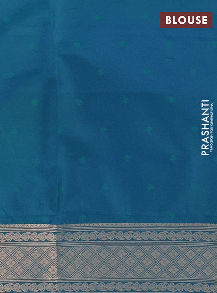 Semi soft silk saree dual shade of greenish blue with allover zari woven checked pattern and zari woven butta border