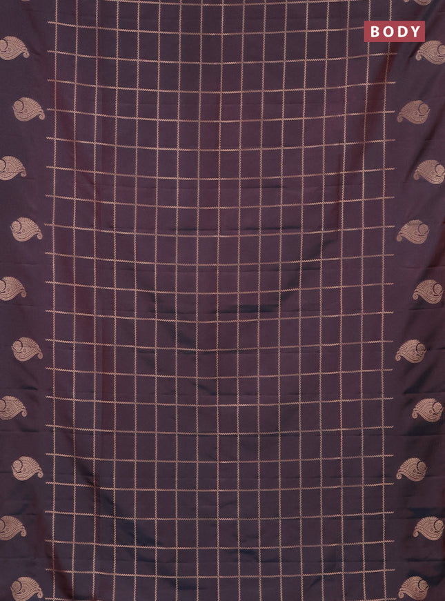 Semi soft silk saree dual shade of bluish maroon with allover zari woven checked pattern and zari woven butta border