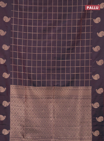 Semi soft silk saree dual shade of bluish maroon with allover zari woven checked pattern and zari woven butta border
