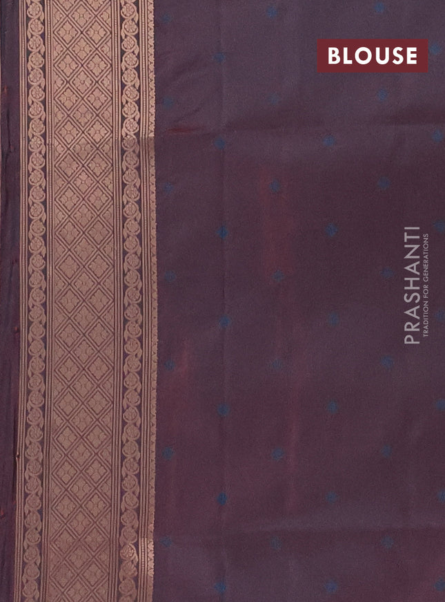 Semi soft silk saree dual shade of bluish maroon with allover zari woven checked pattern and zari woven butta border