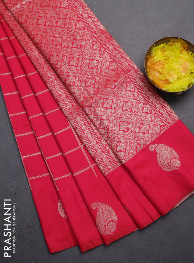 Semi soft silk saree pink with allover zari woven checked pattern and zari woven butta border