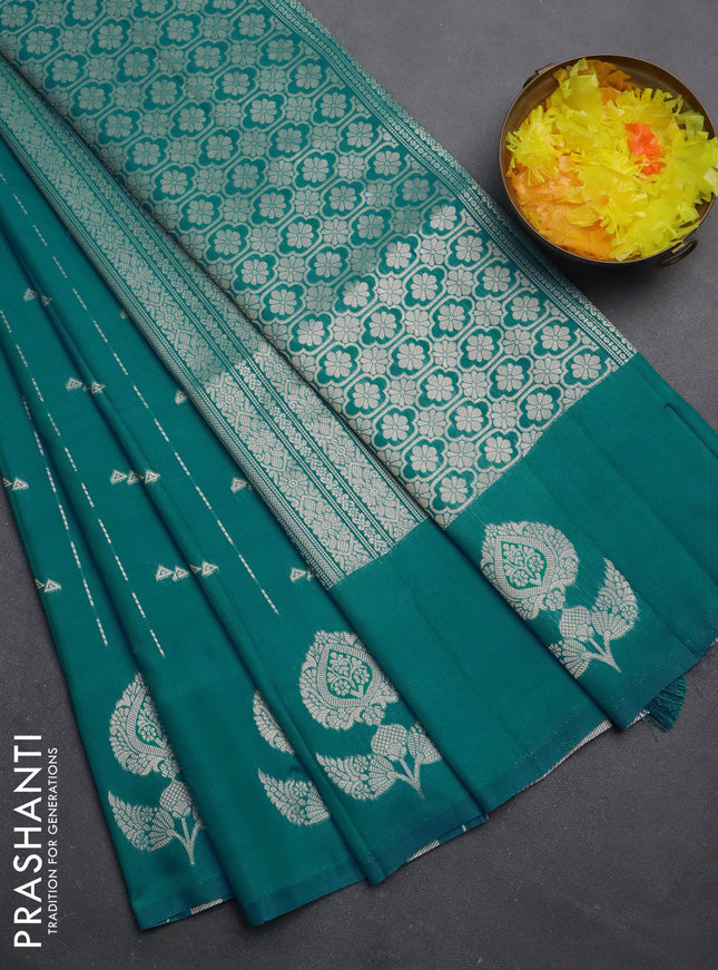 Semi soft silk saree teal blue with allover zari weaves and zari woven butta border