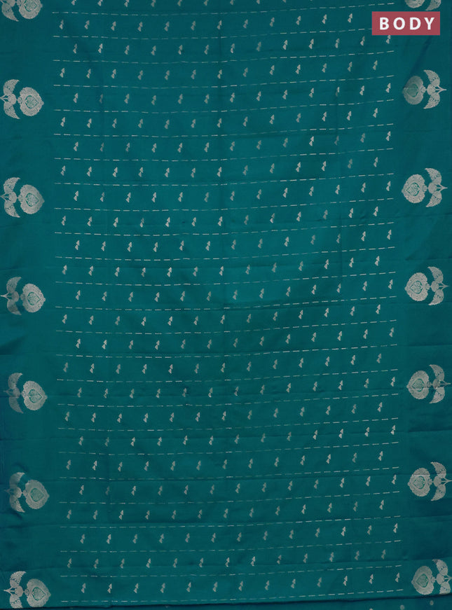 Semi soft silk saree teal blue with allover zari weaves and zari woven butta border