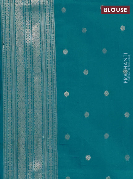 Semi soft silk saree teal blue with allover zari weaves and zari woven butta border