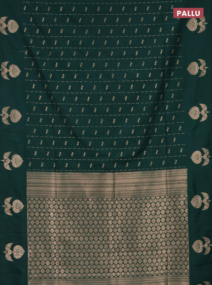 Semi soft silk saree dark green with allover zari weaves and zari woven butta border